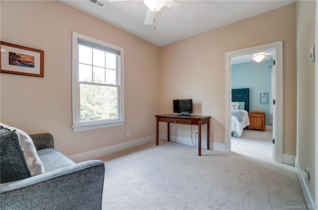 694 Revival Row Fort Mill, SC 29708 - Photo 30 of 46 a living room with furniture and a window