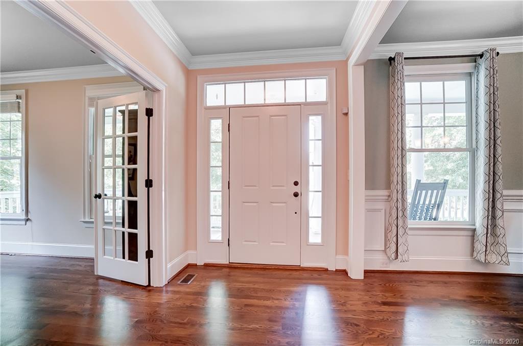 694 Revival Row Fort Mill, SC 29708 - Photo 4 of 46 a view of entryway with wooden floor and stairs
