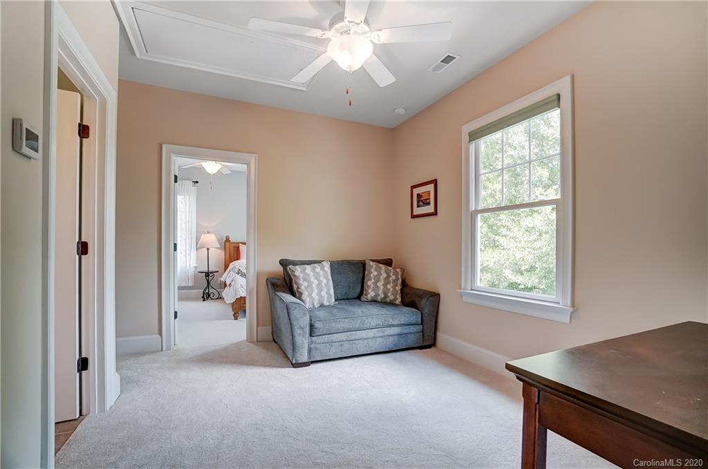 694 Revival Row Fort Mill, SC 29708 - Photo 31 of 46 a living room with furniture and a window