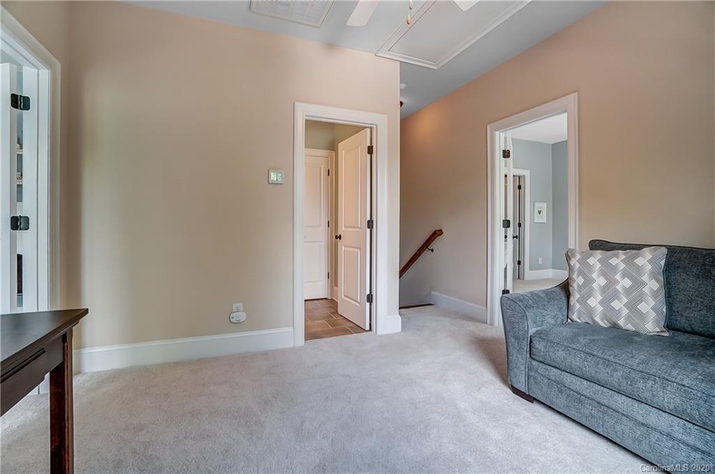 694 Revival Row Fort Mill, SC 29708 - Photo 32 of 46 a living room with furniture and a couch