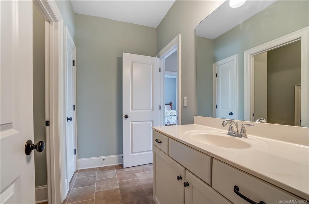 694 Revival Row Fort Mill, SC 29708 - Photo 36 of 46 a bathroom with a sink and a mirror