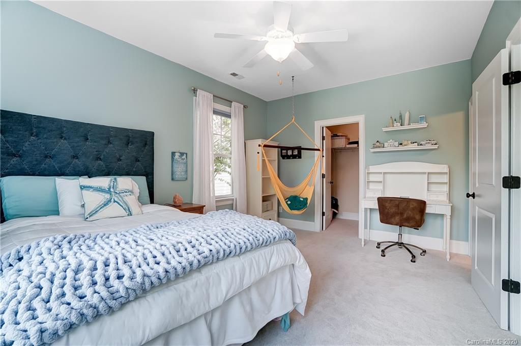 694 Revival Row Fort Mill, SC 29708 - Photo 38 of 46 a bedroom with a bed chair and bed