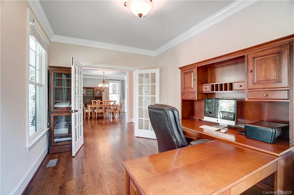 694 Revival Row Fort Mill, SC 29708 - Photo 7 of 46 a dining room with furniture and wooden floor