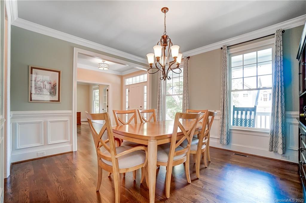 694 Revival Row Fort Mill, SC 29708 - Photo 9 of 46 a view of a dining room with furniture window and wooden floor