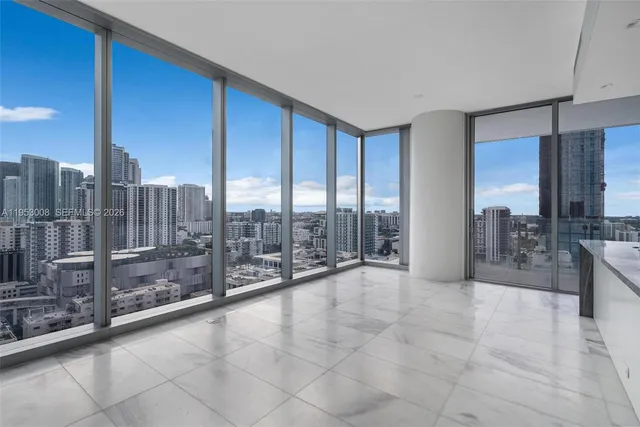 a view of lobby with furniture and floor to ceiling window