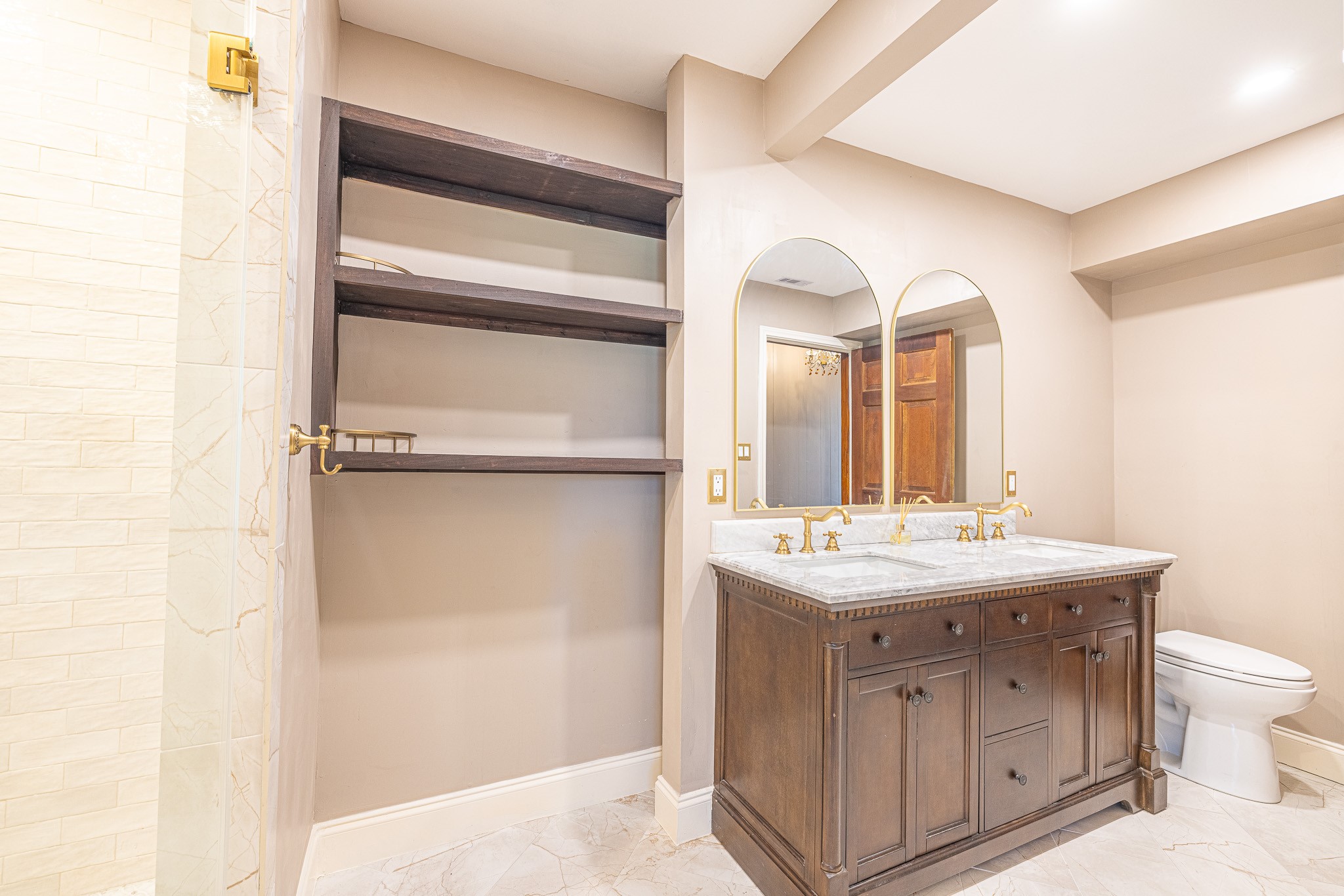 8548 Findlay Street Houston, TX 77017 - Photo 23 of 50 a bathroom with a granite countertop sink mirror and toilet