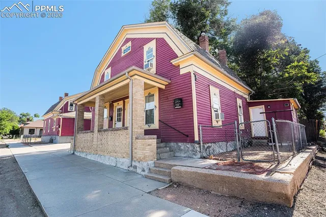 a front view of house with street