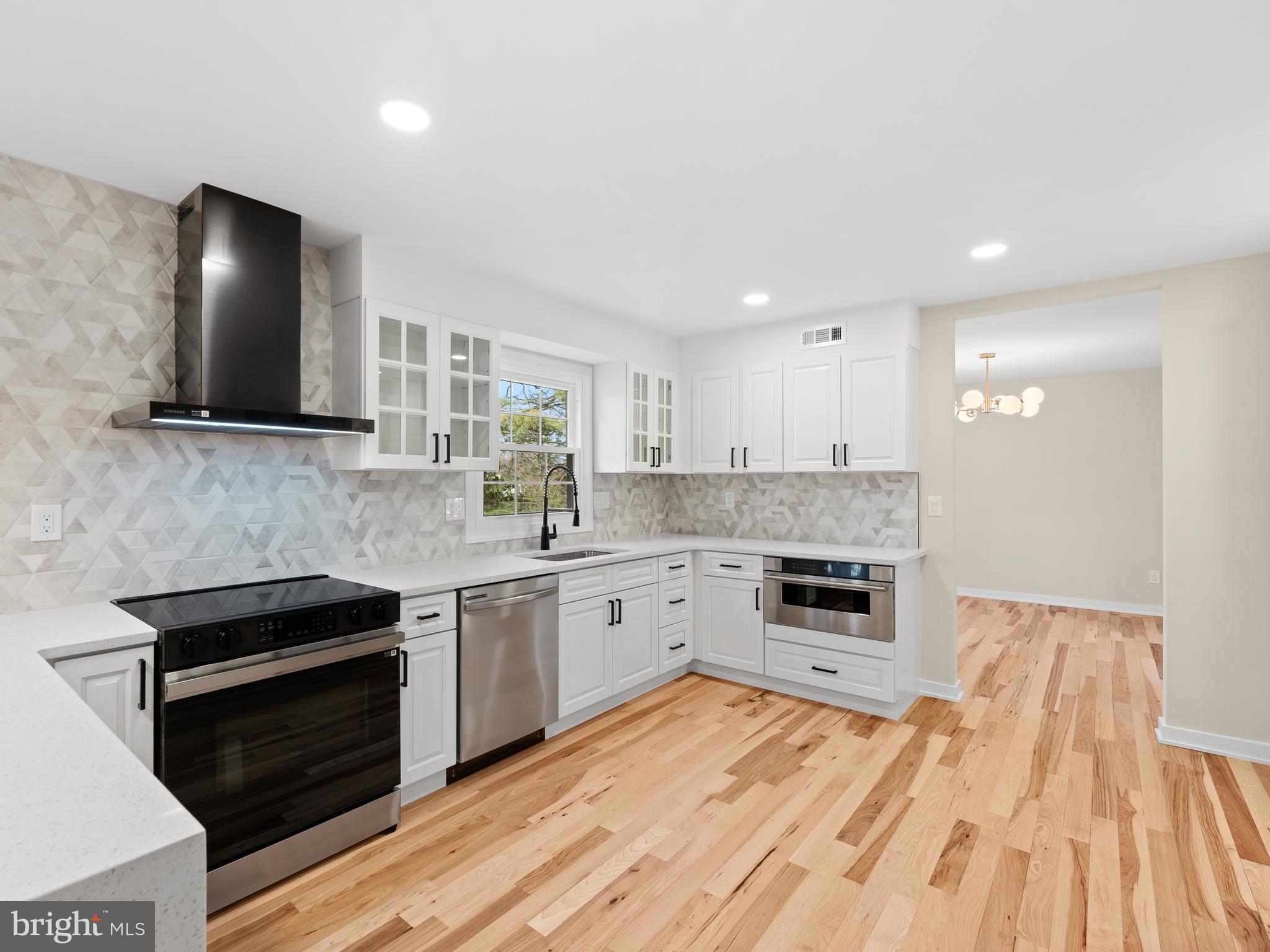 972 Roeloffs Road Yardley, PA 19067 - Photo 19 of 64 a kitchen with a sink stove and microwave