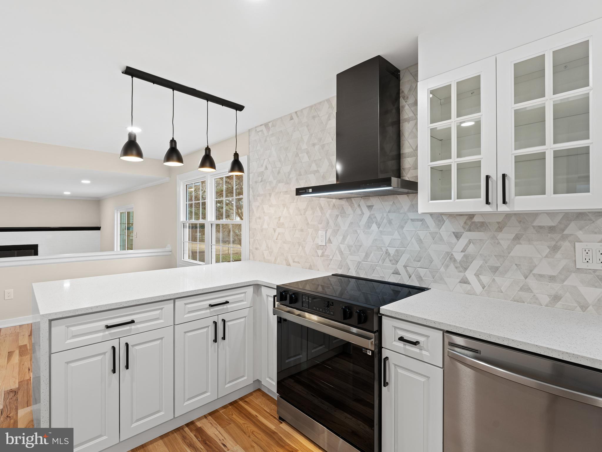972 Roeloffs Road Yardley, PA 19067 - Photo 20 of 64 a kitchen with a sink stove and microwave
