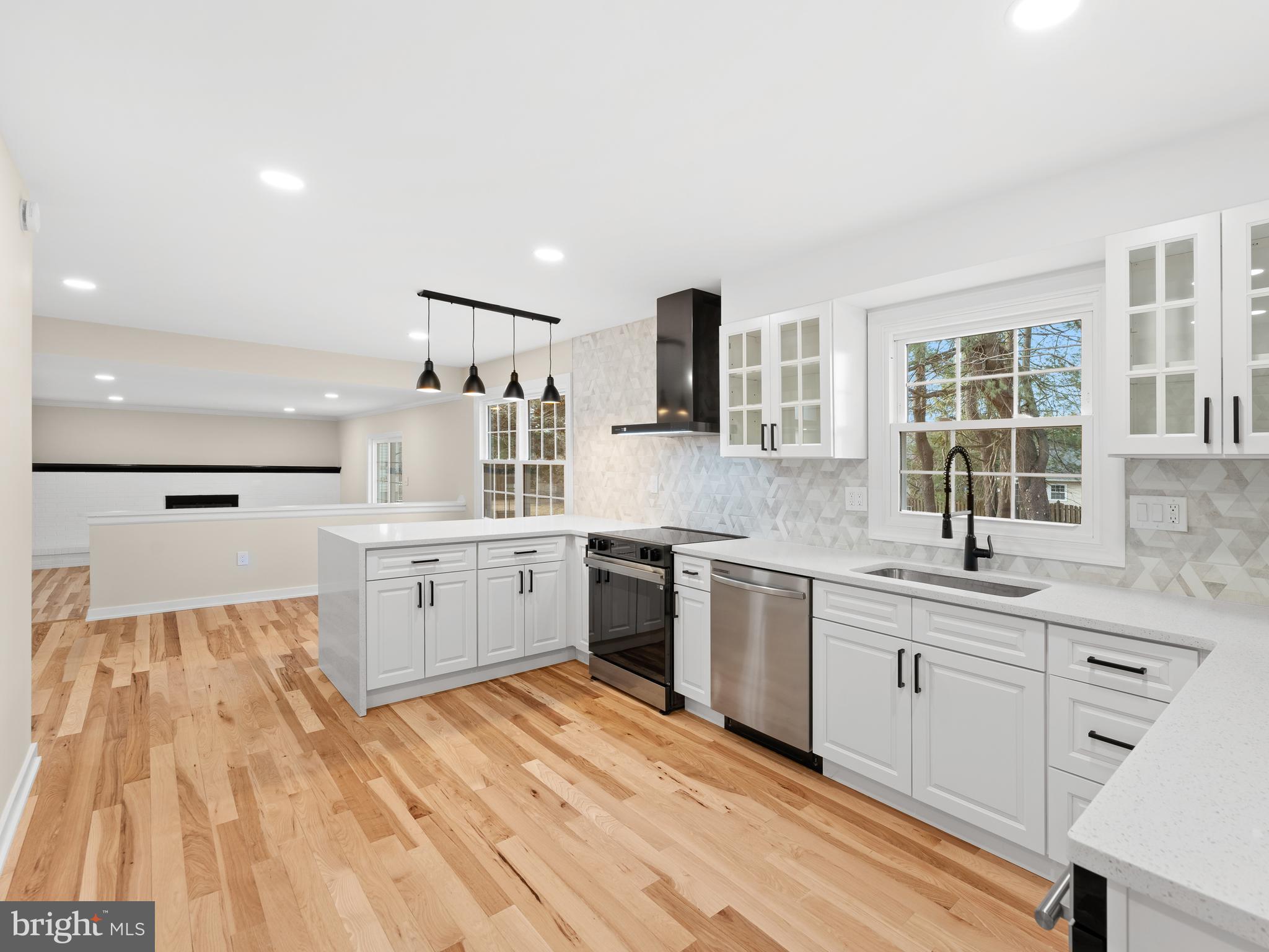 972 Roeloffs Road Yardley, PA 19067 - Photo 22 of 64 a kitchen with a sink stove and cabinets