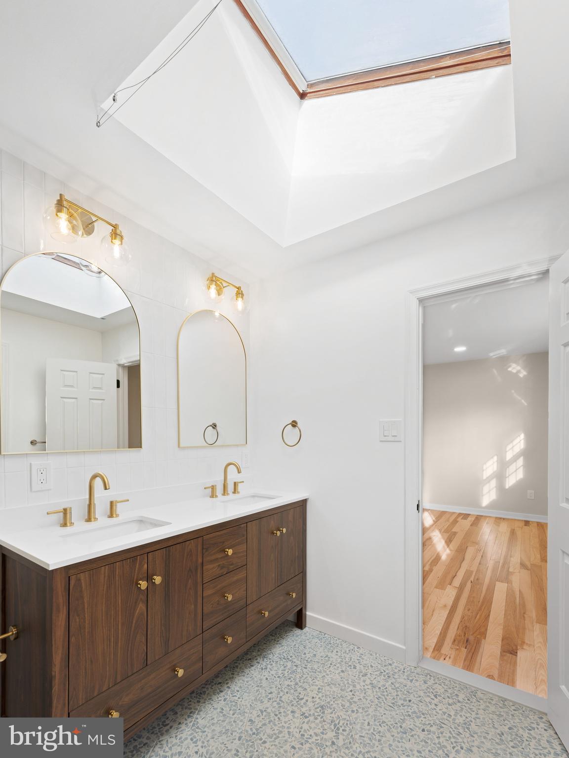 972 Roeloffs Road Yardley, PA 19067 - Photo 32 of 64 a spacious bathroom with a double vanity sink and mirror
