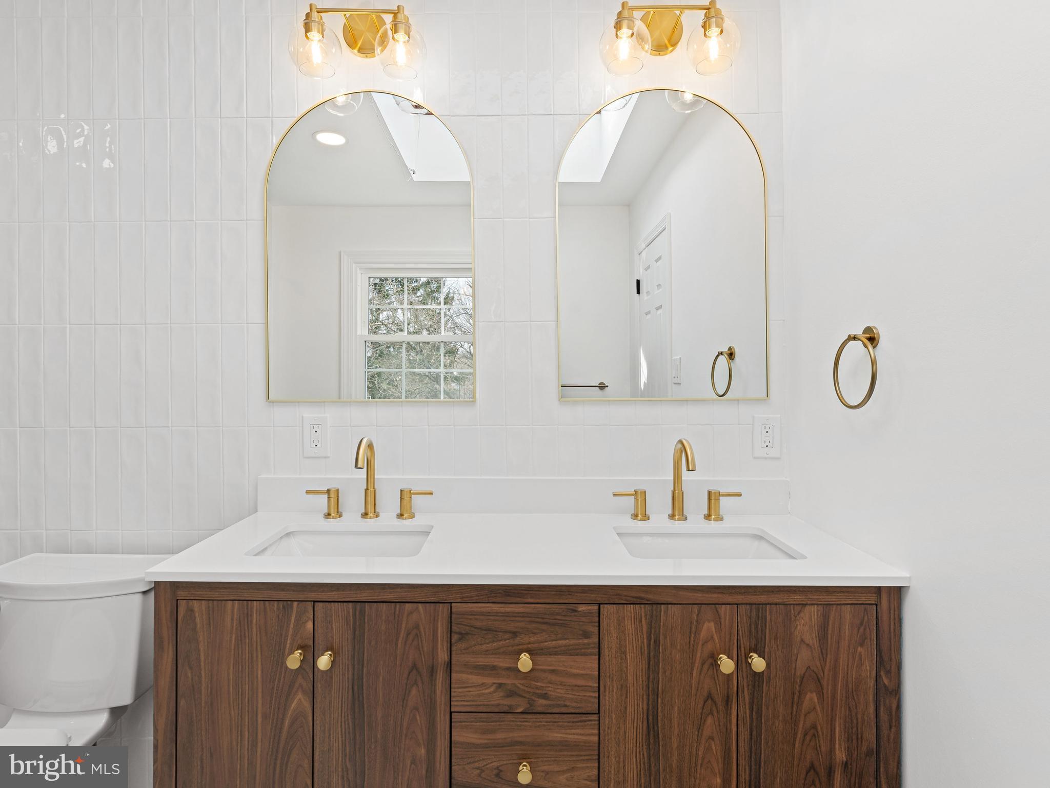 972 Roeloffs Road Yardley, PA 19067 - Photo 33 of 64 a bathroom with a sink and a mirror