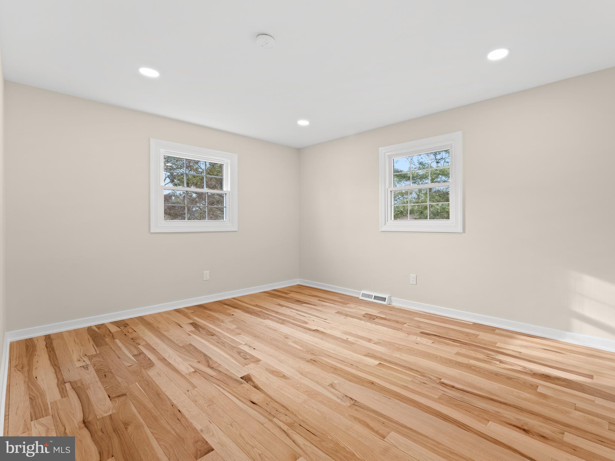 972 Roeloffs Road Yardley, PA 19067 - Photo 37 of 64 a view of empty room with wooden floor