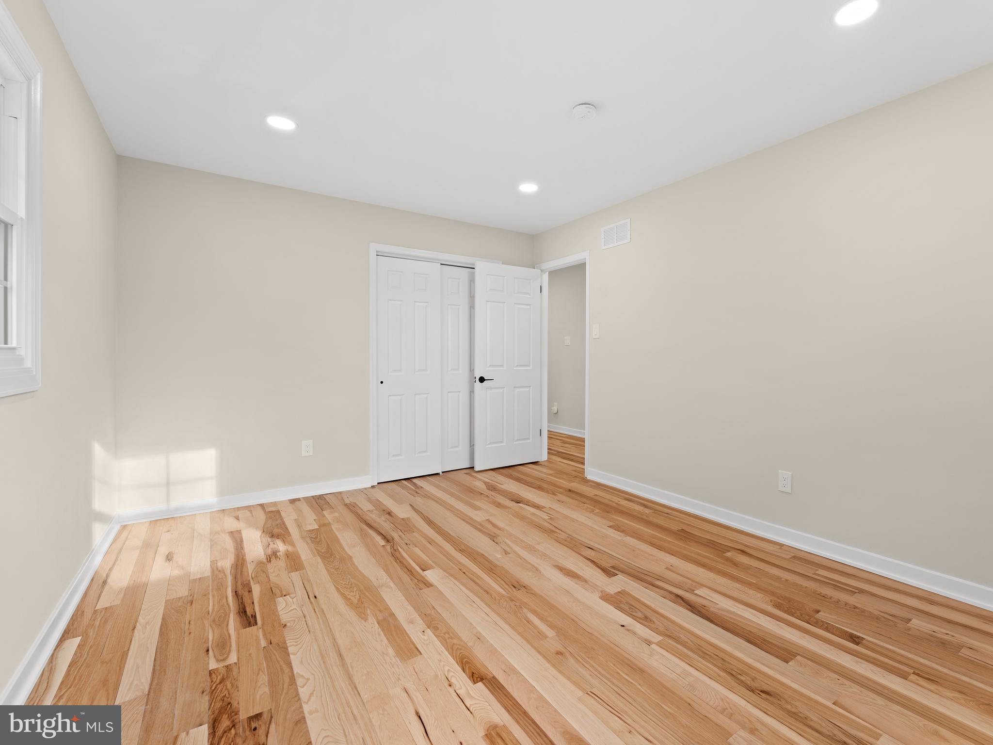 972 Roeloffs Road Yardley, PA 19067 - Photo 38 of 64 a room with a bed and a white walk in closet