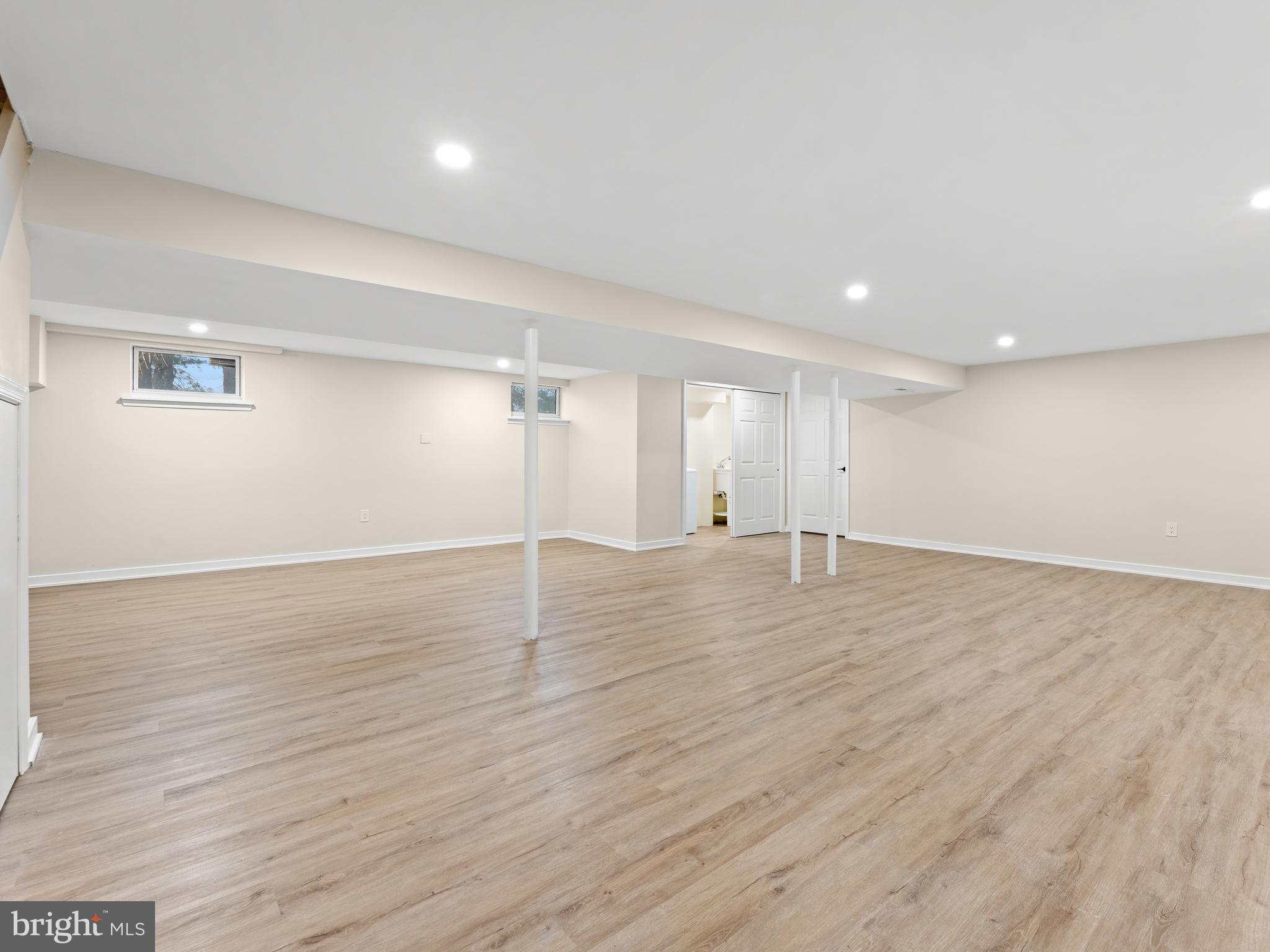 972 Roeloffs Road Yardley, PA 19067 - Photo 44 of 64 an empty room with wooden floor and windows