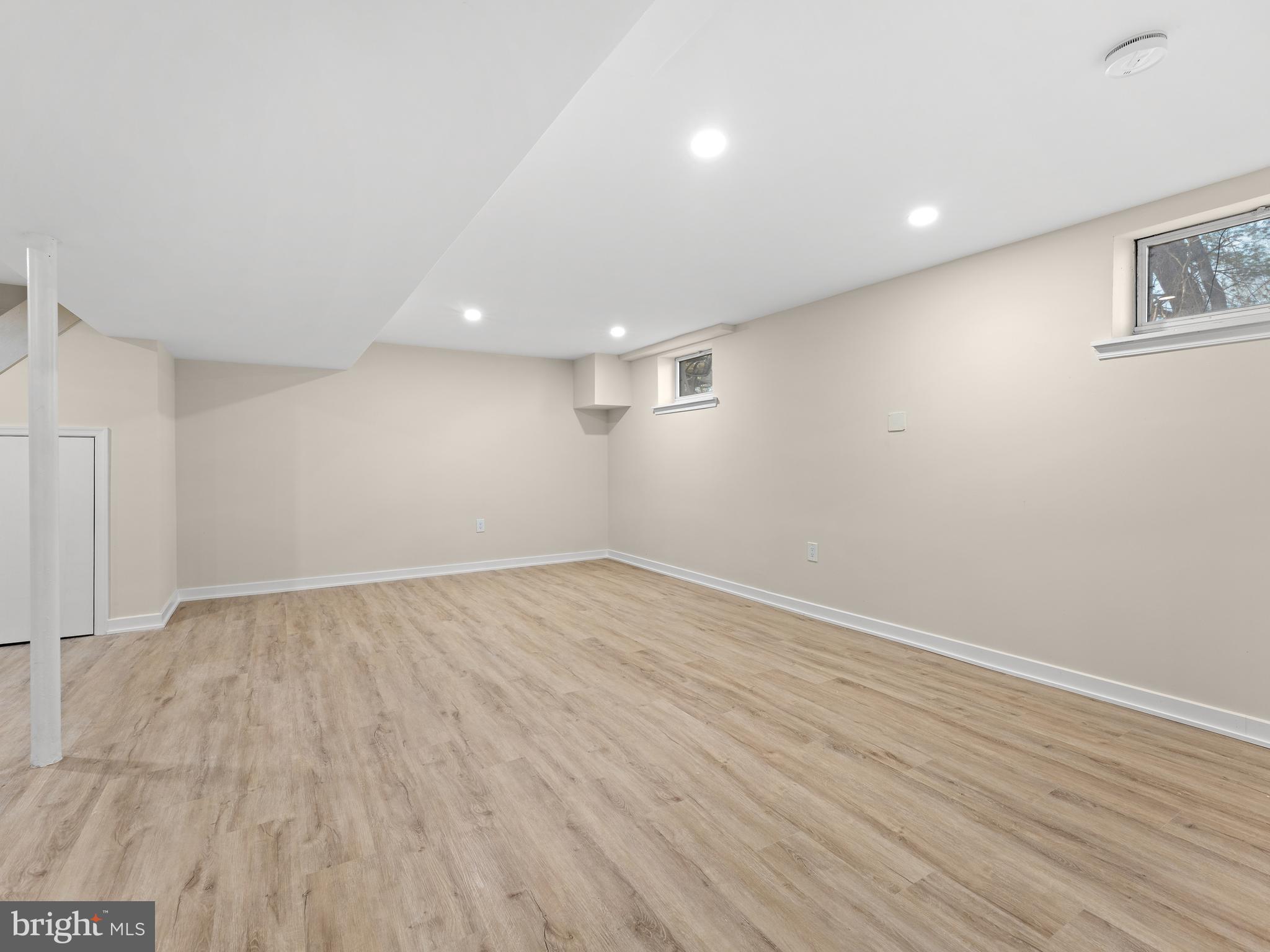 972 Roeloffs Road Yardley, PA 19067 - Photo 46 of 64 an empty room with wooden floor and windows