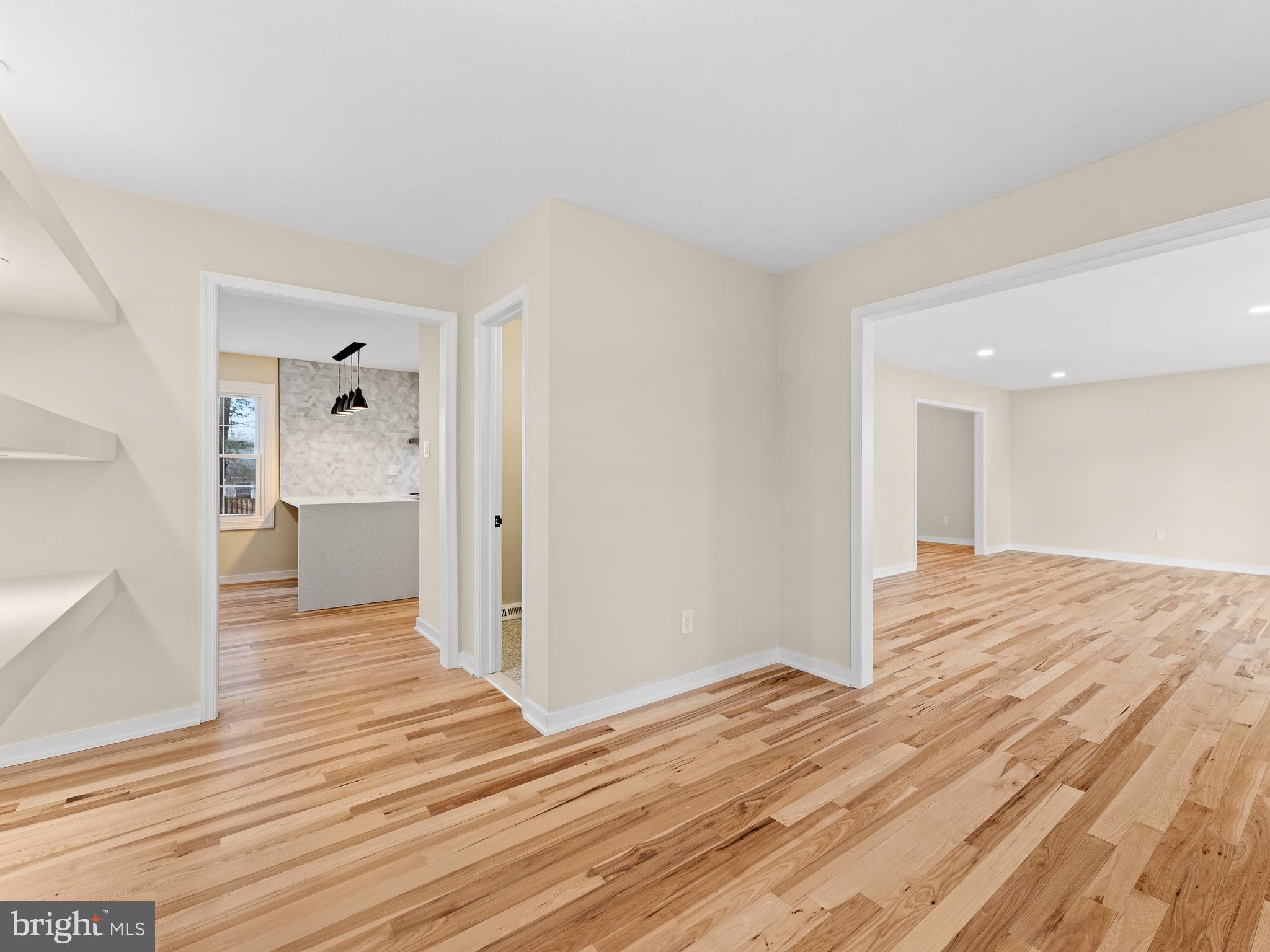 972 Roeloffs Road Yardley, PA 19067 - Photo 5 of 64 a view of a livingroom with wooden floor and a bathroom