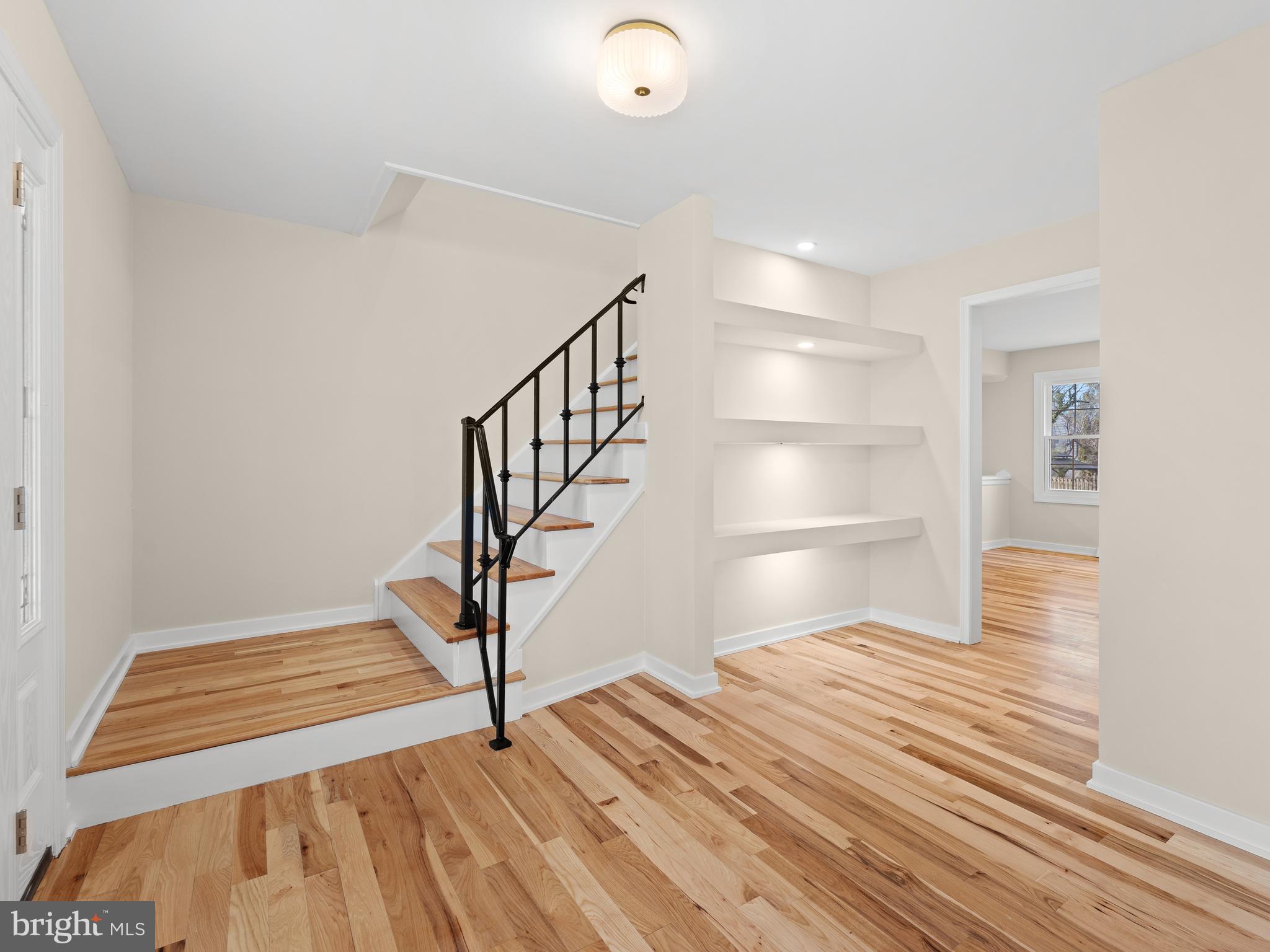 972 Roeloffs Road Yardley, PA 19067 - Photo 7 of 64 a view of a room with wooden floor and staircase