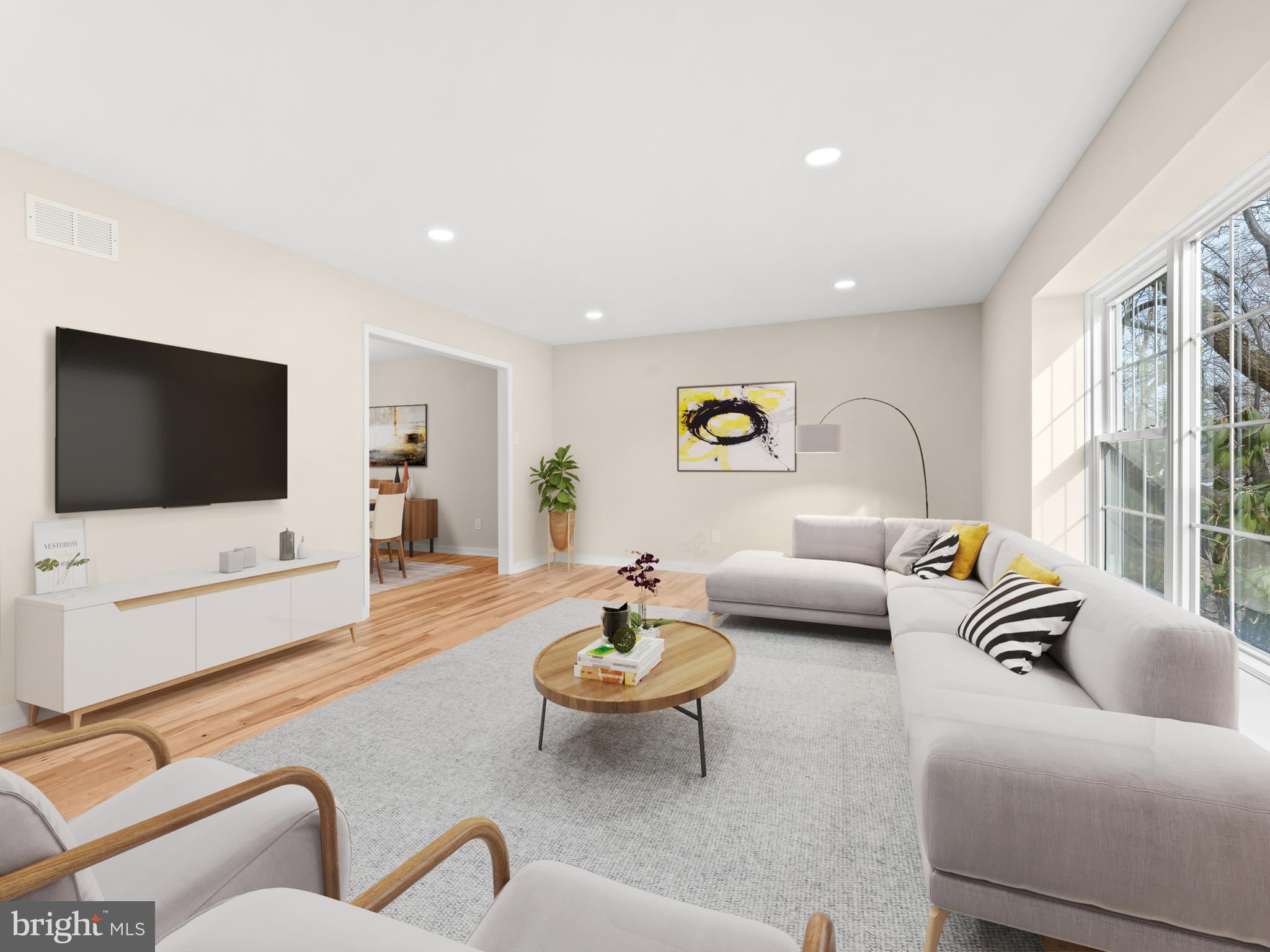 972 Roeloffs Road Yardley, PA 19067 - Photo 8 of 64 a living room with furniture and a flat screen tv