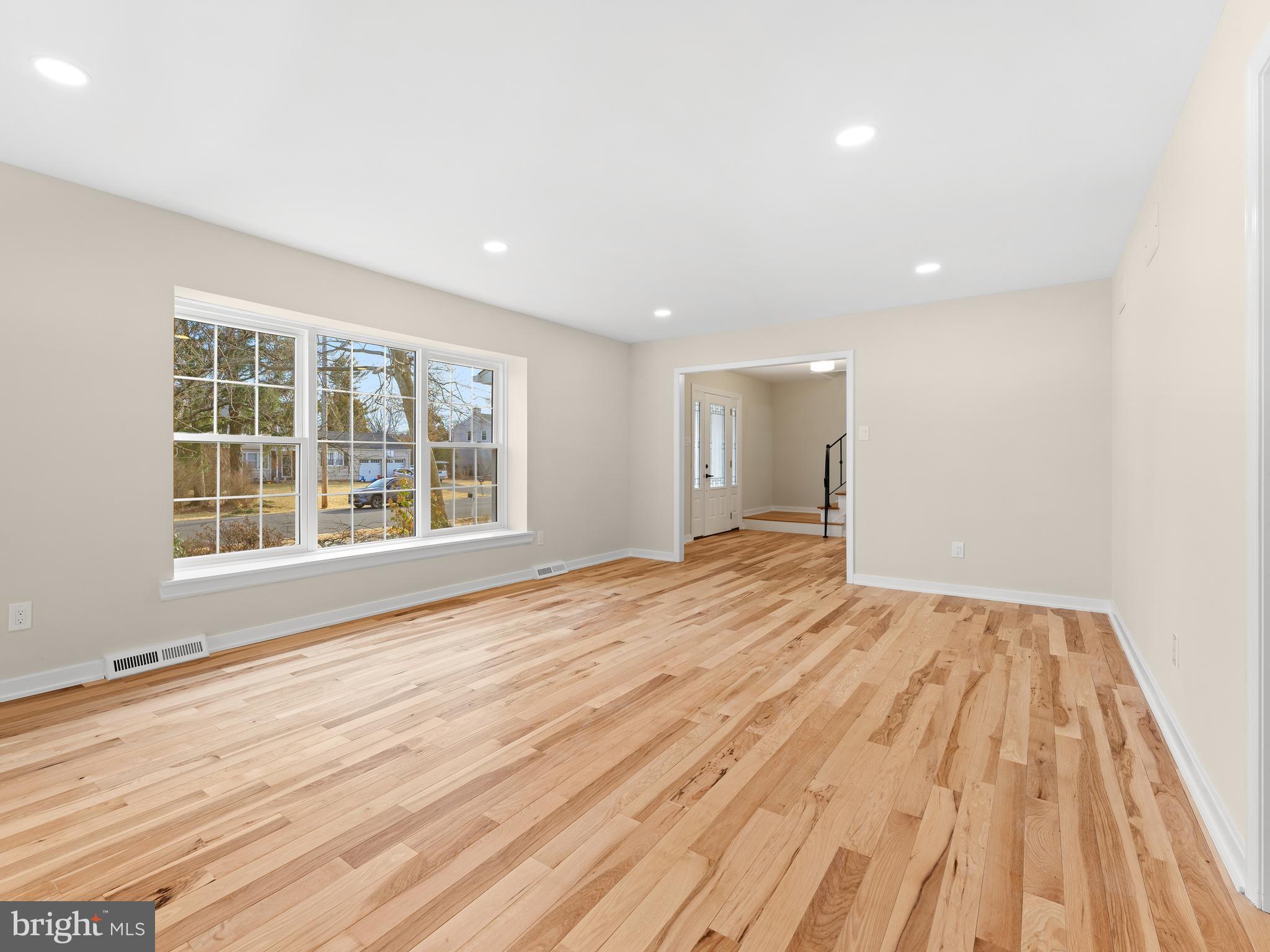 972 Roeloffs Road Yardley, PA 19067 - Photo 10 of 64 a view of empty room with wooden floor and fan