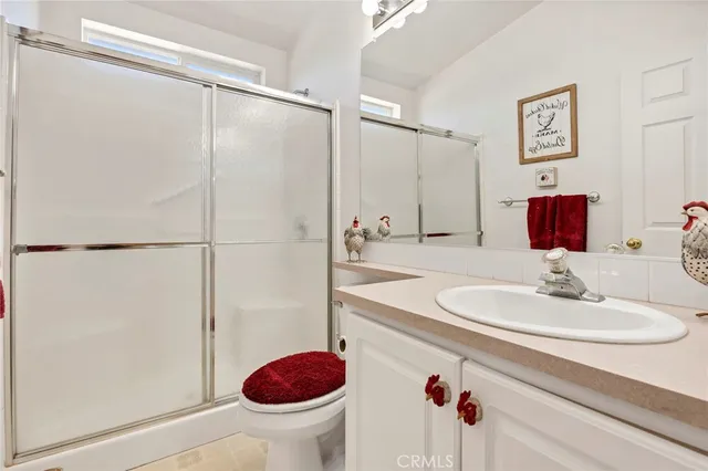 a view of a patio with table and chairs