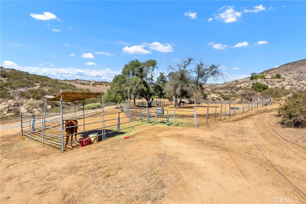 35125 Stirrup Road Temecula, CA 92592 - Photo 38 of 51 a view of a swimming pool with an ocean view