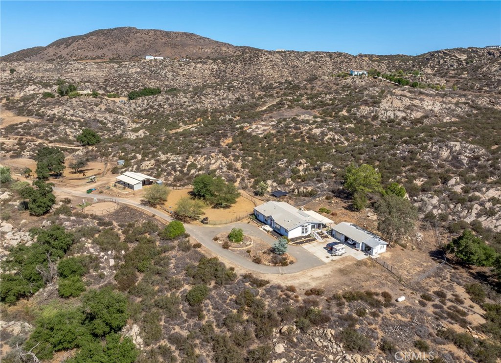 35125 Stirrup Road Temecula, CA 92592 - Photo 41 of 51 a view of a field with a mountain in the background