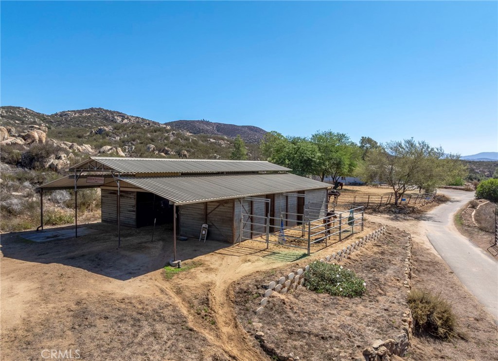35125 Stirrup Road Temecula, CA 92592 - Photo 45 of 51 a view of a house with pool and furniture