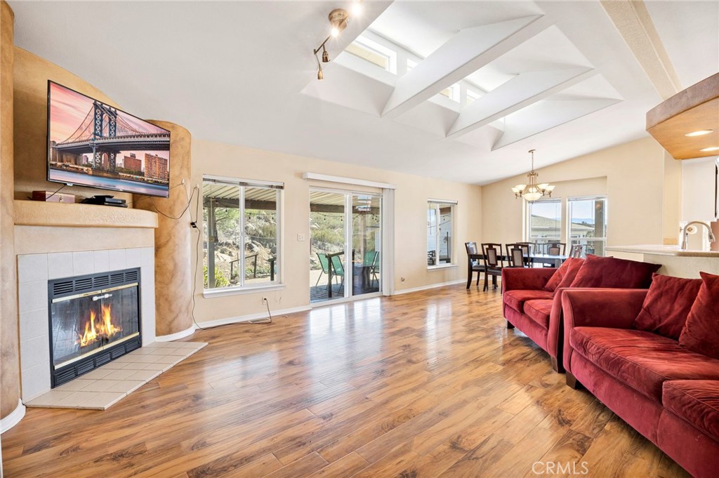 35125 Stirrup Road Temecula, CA 92592 - Photo 7 of 51 a living room with furniture fireplace and flat screen tv