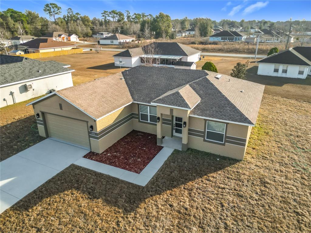 12847 Southwest 73rd Street Ocala, FL 34473 - Photo 2 of 28 a view of a terrace with wooden floor