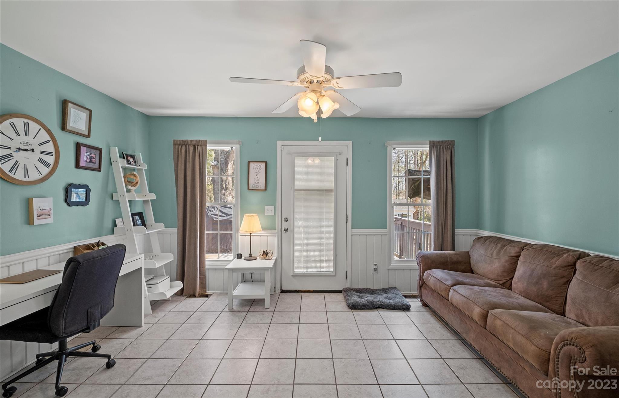 614 Maple Ridge Circle Salisbury, NC 28147 - Photo 13 of 46 a living room with furniture and a window