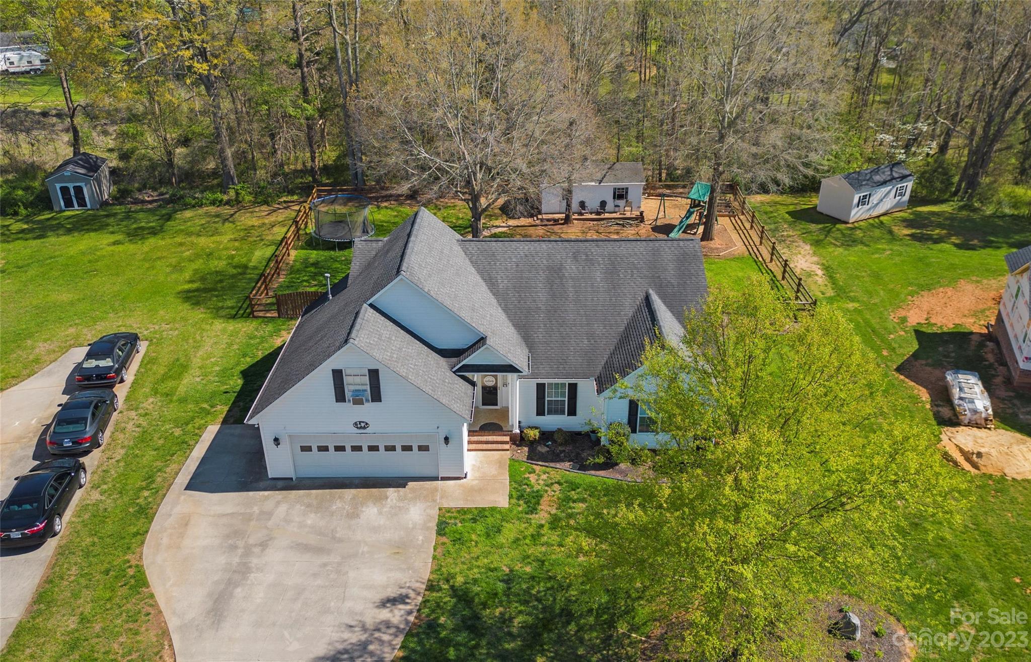614 Maple Ridge Circle Salisbury, NC 28147 - Photo 3 of 46 an aerial view of a house with swimming pool garden and mountain view