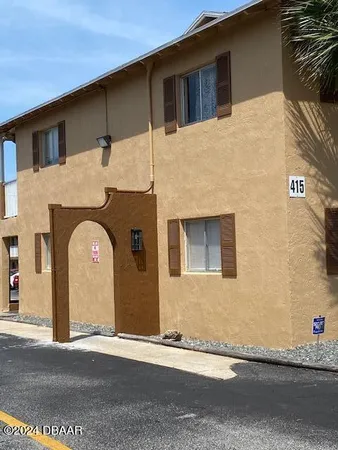 a house view with a outdoor space
