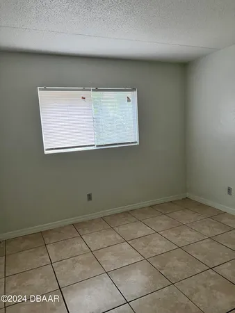a view of a room with an empty space