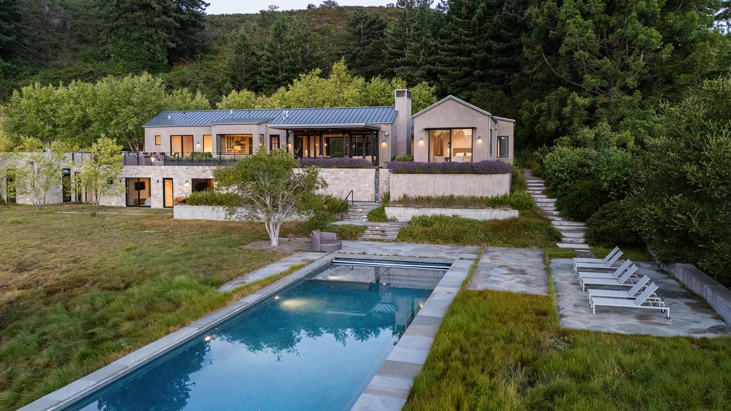 19 Rancho San Carlos Road Carmel, CA 93923 - Photo 1 of 30 a aerial view of a house with swimming pool and a yard