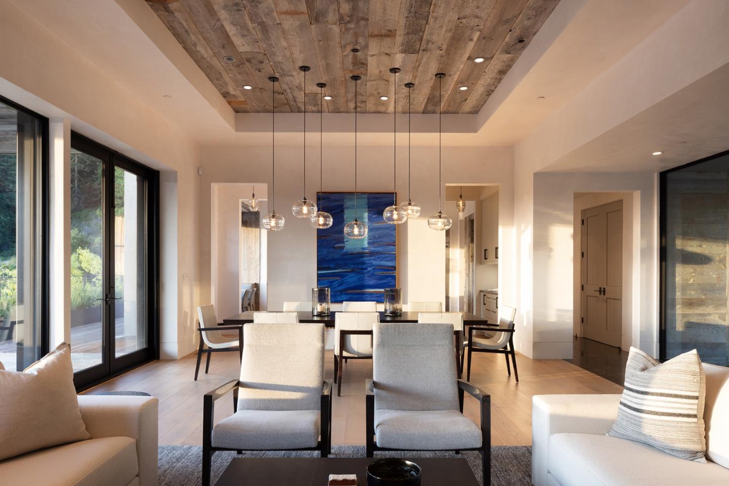 19 Rancho San Carlos Road Carmel, CA 93923 - Photo 11 of 30 a dining room with furniture and a chandelier