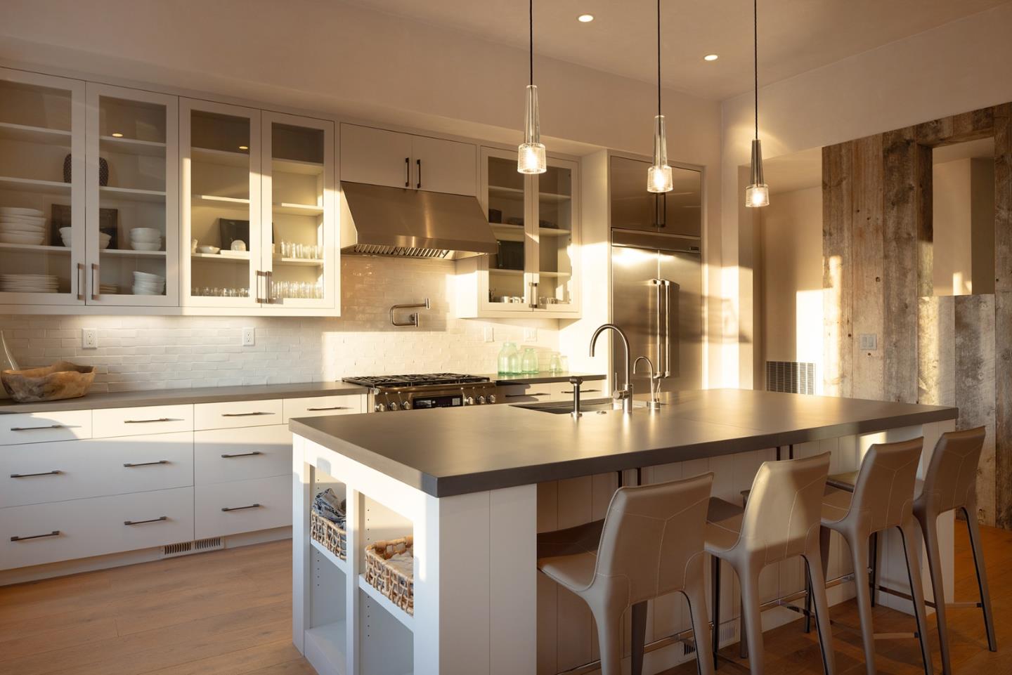 19 Rancho San Carlos Road Carmel, CA 93923 - Photo 16 of 30 a kitchen with a table chairs sink and cabinets