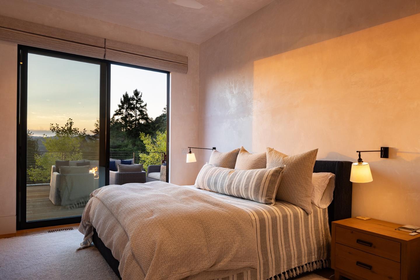 19 Rancho San Carlos Road Carmel, CA 93923 - Photo 18 of 30 a bedroom with a large bed and a large window