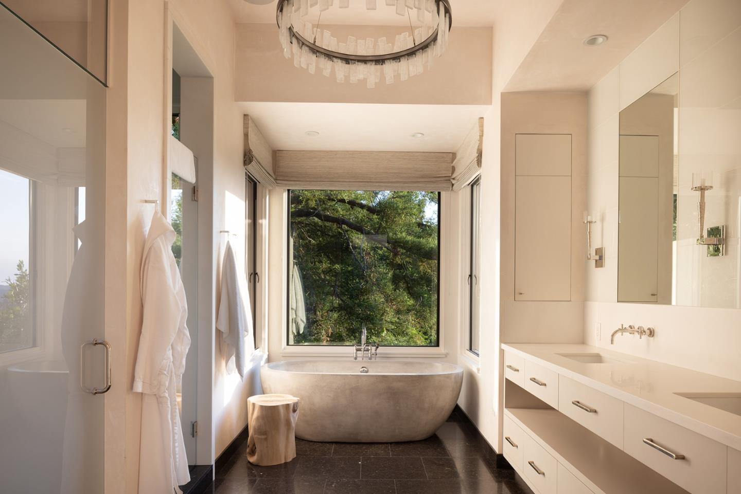 19 Rancho San Carlos Road Carmel, CA 93923 - Photo 19 of 30 a bathroom with a tub sink and mirror