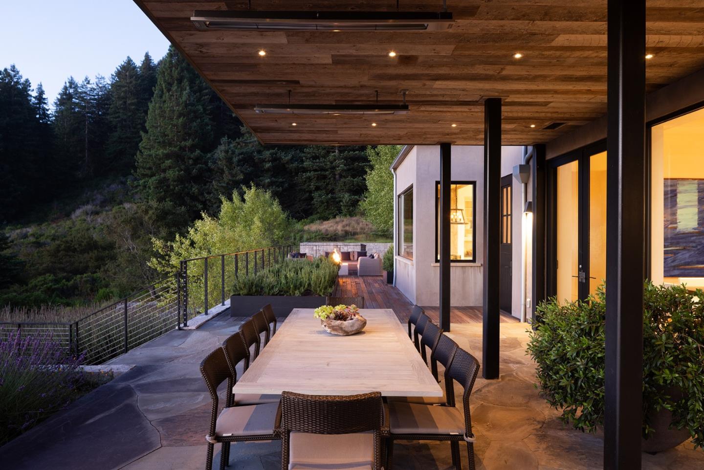 19 Rancho San Carlos Road Carmel, CA 93923 - Photo 26 of 30 a view of a patio with table and chairs with wooden floor and fence