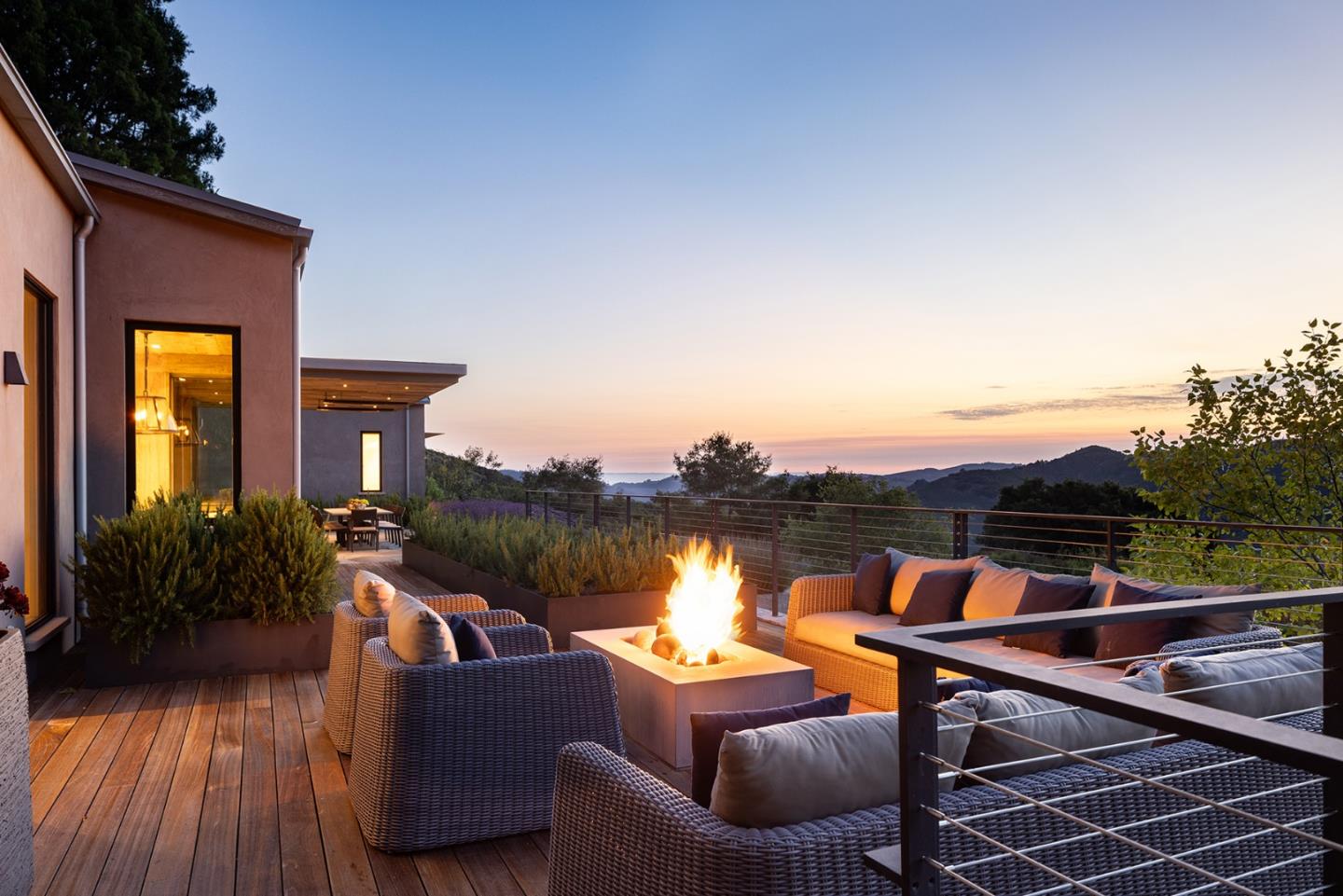 19 Rancho San Carlos Road Carmel, CA 93923 - Photo 5 of 30 a view of a patio with couches table and chairs and potted plants