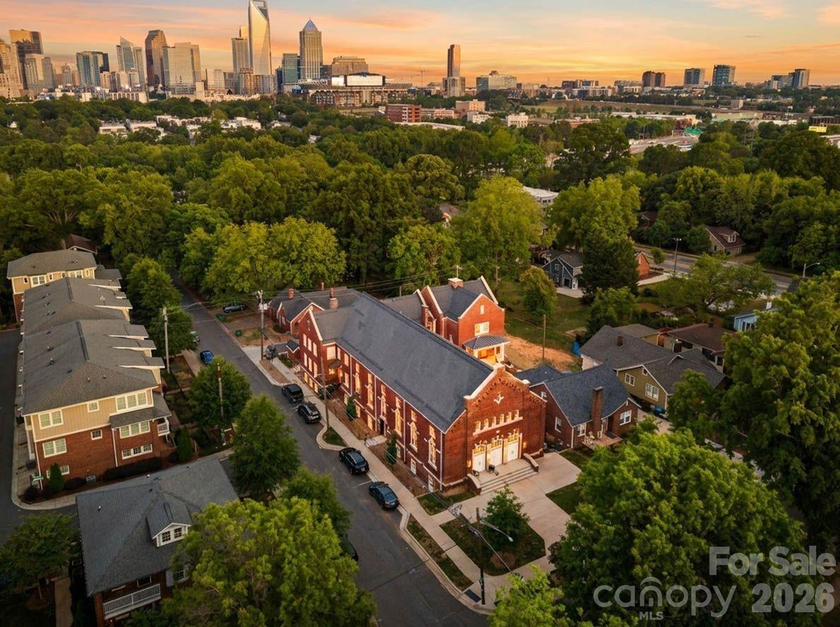 203 Grandin Road, Unit 1 Charlotte, NC 28208 - Photo 2 of 32 an aerial view of city and lake