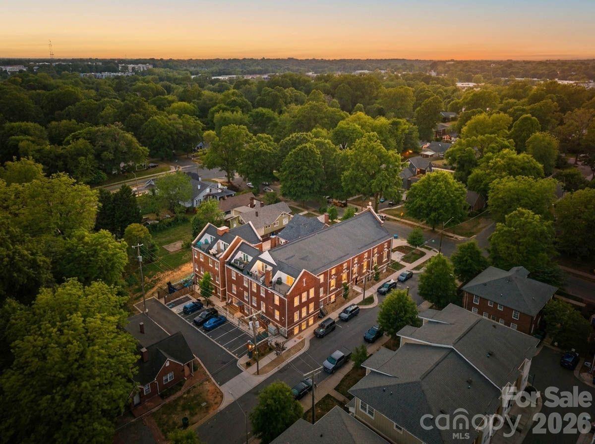 203 Grandin Road, Unit 1 Charlotte, NC 28208 - Photo 3 of 32 an aerial view of a houses with a yard