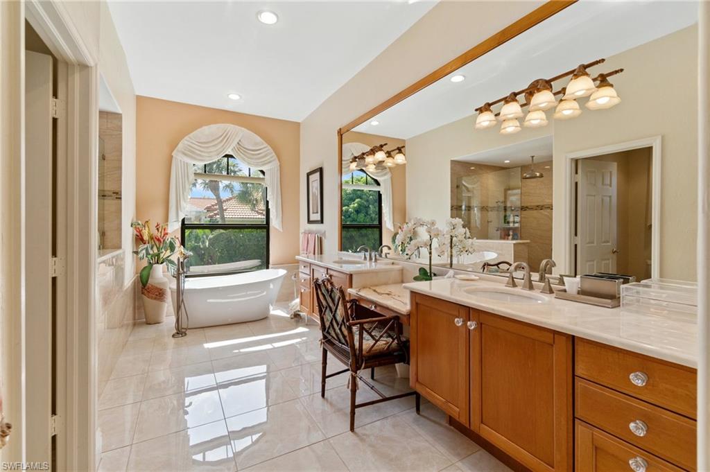 431 Palm Court Naples, FL 34108 - Photo 27 of 50 a large kitchen with a large window