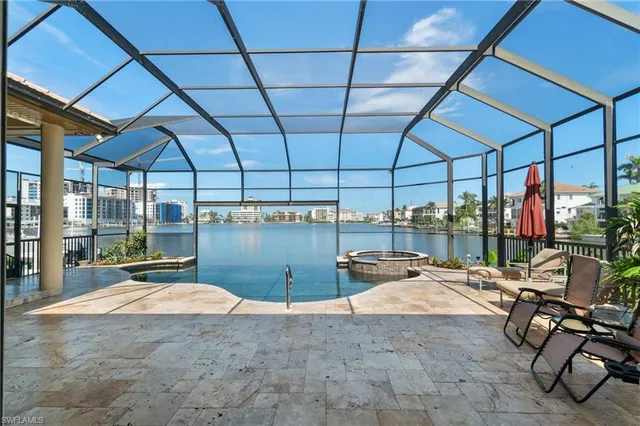 a kitchen with a table and chairs