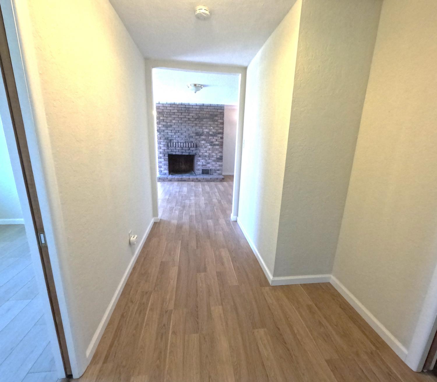 21665 Manton School Road Manton, CA 96059 - Photo 18 of 30 a view of a hallway with wooden floor