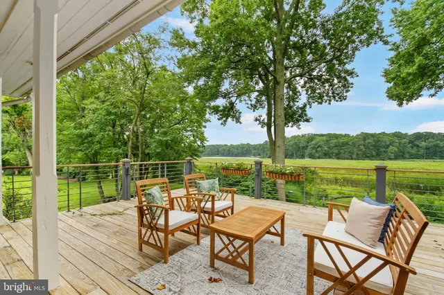 a view of a lake with a yard