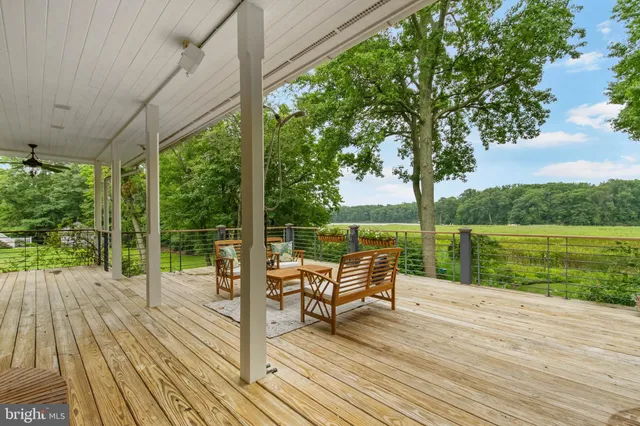 a view of a balcony with chairs