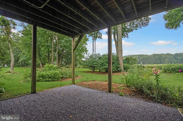 an aerial view of a house with a garden