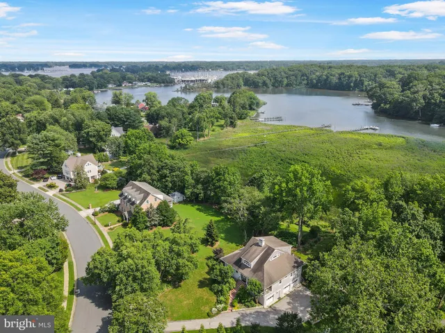 a view of a lake with a big yard